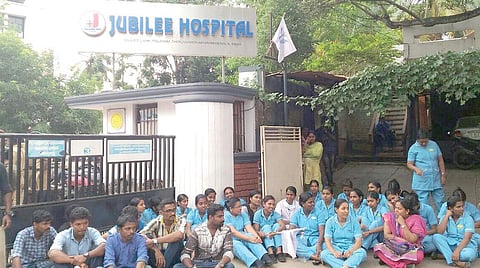 Nurses of Jubilee Hospital protesting under the leadership of United Nurses Association demanding pay revision in front of the hospital in Thiruvananthapuram on Tuesday | Express