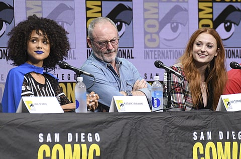 Nathalie Emmanuel, Liam Cunningham, and Sophie Turner who plays Missandei, Davos Seaworth and Sansa Stark respectively in HBO's 'Game of Thrones' series attend the  panel on day two of Comic-Con International. (AP)