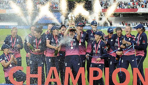 England players celebrate with trophy after winning the ICC Women's World Cup 2017 final match against India at Lord's in London England Sunday July 23 2017.  | AP