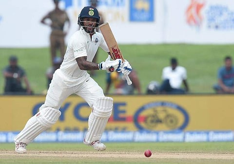 ndian cricketer Shikar Dhawan plays a shot during the first day of first Test match between Sri Lanka and India at Galle International Cricket Stadium in Galle|AFP