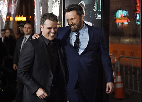 FILE - In this Jan. 9, 2017 file photo, Ben Affleck, right, and Matt Damon appear at the 'Live by Night,' premiere in Los Angeles. Showtime says Oscar-winning filmmakers Ben Affleck and Matt Damon are re-teaming off-screen for a new one-hour drama pilot. 
