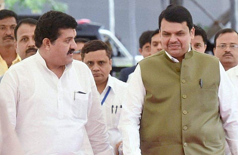 Maharashtra Public Works Minister and BJP leader Chandrakant Patil along with the state Chief Minister Devendra Fadnavis. | PTI File Photo