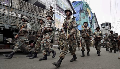 Darjeeling Security personnel patrol a road during GJM strike in Darjeeling. ( File photo by PTI)