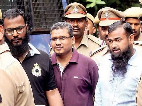 The acquitted persons in the 2005 suicide bomb blast walk out of the  Nampally Court on Thursday | Express  photo