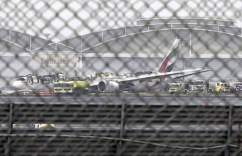 The damaged Boeing 777 is seen at the Dubai airport after it crash-landed in Dubai.  (Photo | AP)