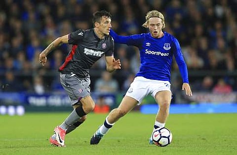 Everton's Tom Davies, right, in action with Hajduk Split's Hysen Memolla during their Europa League Play-Off, First Leg soccer match at Goodison Park in Liverpool. | AP