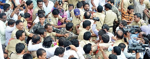 Police arrests Congress leader and former MLA T Jayaprakash Reddy; (below) Supporters of Jayaprakash Reddy stop the  police vehicle after his arrest in Sangareddy on Thursday | Express photo
