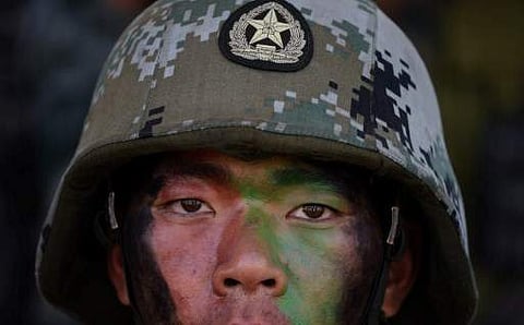 China Central Television played a five minute video of the PLA conducting drills involving rockets, tanks and helicopters (File | AFP)