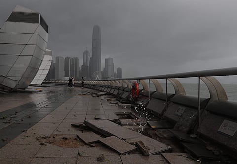 Debris caused by Typhoon Hato damage is strewn across the waterfront of Victoria Habour in Hong Kong, Wednesday, Aug. 23, 2017.  | AP