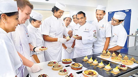 Niklesh( third from right) with students. (EPS | Jithendra M)