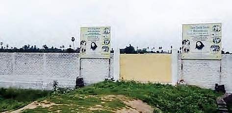 A compound wall constructed around the land owned by Dera Sacha Sauda located at Veliminedu village in Nalgonda district | EXPRESS