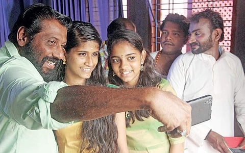 Director Siddique takes a selfie with fans at Kalabhavan  Melton Antony