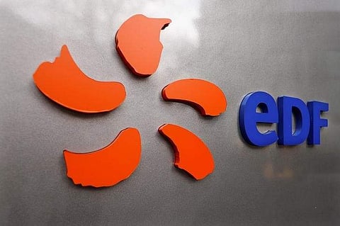 The logo of France's state-owned electricity company EDF is seen on the company's headquarters in Paris. (Photo | Reuters)