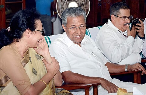 Outgoing Chief Secretary Nalini Netto having a word with Chief Minister Pinarayi Vijayan at the farewell accorded to her at the Durbar Hall of the Secretariat on Wednesday. Chief Secretary-designate KM Abraham is also seen | B P Deepu