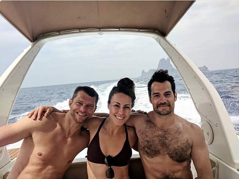 Henry Cavill (right) with  his girlfriend Lucy Cork (Photo | Twitter)