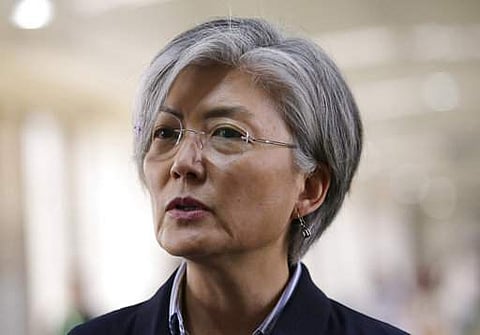 South Korean Foreign Minister Kang Kyung-wha answers questions from reporters as she arrives for the 50th ASEAN Foreign Ministers' Meeting and its dialogue partners at the airport in Manila, Philippines on August 5. (Photo | AP)