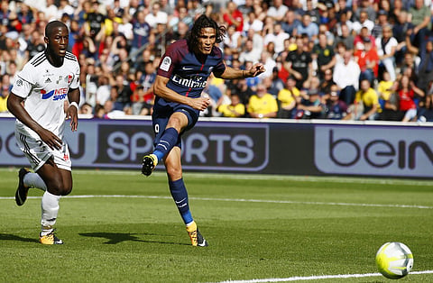 PSG's Edinson Cavani, right, scores a goal during the French major soccer league opening match between Paris Saint-Germain and Amiens at the Parc des Princes stadium in Paris Saturday, Aug. 5, 2017. (Photo| AP)