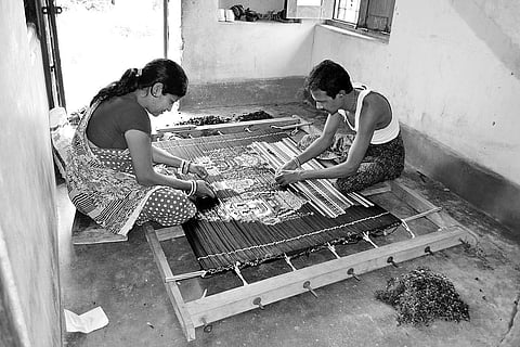 A major force in weaving business, women weavers play second fiddle to men 