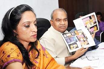 KDA Chairman Prof Siddaramaiah (right) and Director Tourism Dept Dr Manjula N  at a meeting in Bengaluru on Tuesday. | Express Photo Service