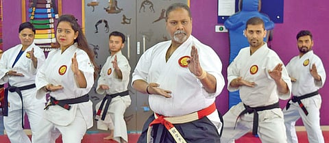 Ranka (centre) with students
