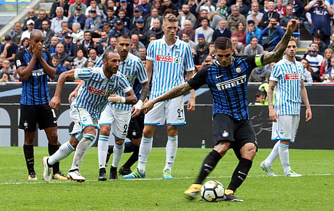 Inter Milan's Mauro Icardi scores during the Serie A soccer match between Inter Milan and Spal, at the San Siro Stadium in Milan, Italy, Sunday. | AP