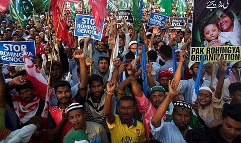 Supporters of Jamaat-e-Islami, a Pakistani religious group, chant slogans during a rally to condemn ongoing violence against the Rohingya Muslim minority in Myanmar, in Karachi, Pakistan on Sept.10, 2017. (Photo | AP)