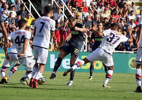 Inter Milan's Milan Skriniar, center, scores during a Serie A soccer match between Crotone and Inter Milan at the Ezio Scida Stadium in Crotone, Italy, Saturday, Sept. 16, 2017. | AP