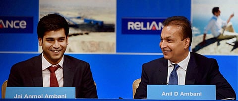 Chairman of Reliance infrastructure Anil Ambani and his son Jai Anmol Ambani during the Reliance capital AGM in Mumbai on Tuesday. | PTI