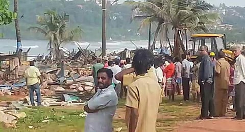 The houses of the construction workers from Karnataka, being demolished at Baina beach in Goa on Wednesday | Express