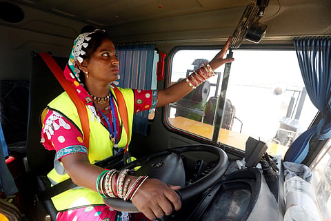 Gulaban, a 25-year old mother of three, adjusts a fan before driving a 60-tonne truck, during a training session in Islamkot, Tharparkar, Pakistan on September 21. (File Photo | Reuters)