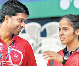 Pullela Gopi Chand (left) and Saina Nehwal.