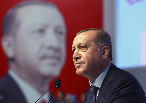 Turkey's President Recep Tayyip Erdogan, talks to supporters, in Istanbul, Sunday, Aug. 20, 2017. | AP