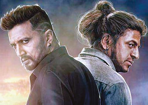 Shivarajkumar and Sudeep on the poster of The Villain.
