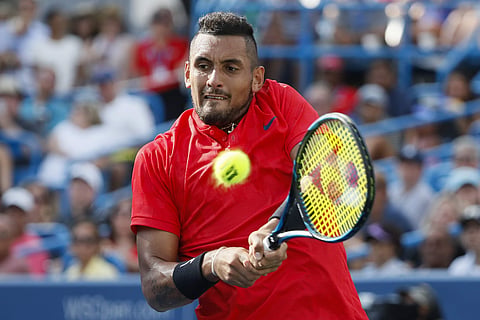 Nick Kyrgios, of Australia, returns to Grigor Dimitrov, of Bulgaria, during the men's singles final at the Cincinnati Masters. | AP