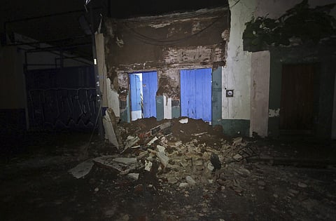 Debris from a collapsed wall sits in Oaxaca, Mexico, after an earthquake early Friday, Sept. 8, 2017. | AP