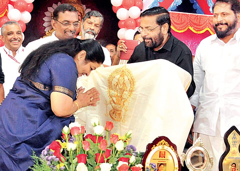 Singer K S Chithra offering prayers before receiving the Harivarasanam Award in Sabarimala on Sunday | SHAJI VETTIPURAM