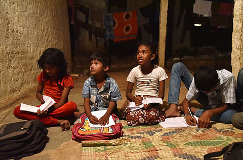 Rohingya refugee staudents at the night school in the Balapur refugee camp. (Express Photo Service)