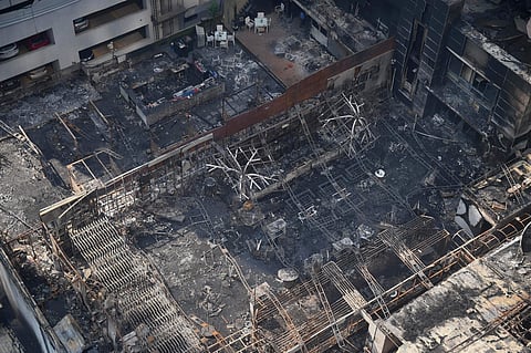 A view of the charred building in which a fire broke out in Mumbai on early Friday. At least 14 people were killed and as many injured after a major fire in Kamala Mills Compound in Lower Parel. | PTI file photo