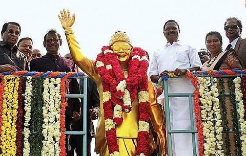 G Viswanathan, founder of VIT (extreme left) with VP of Mauritius, Paramasivum Vyapoory (left) after garlanding the statue of MGR at VIT Chennai | Express
