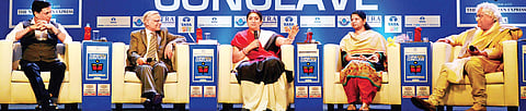 (From L) Film director Madhur Bhandarkar, TNIE editorial director Prabhu Chawla, Union Minister Smriti Irani, DMK MP Kanimozhi and designer Rajeev Sethi at the Conclave | P Jawahar