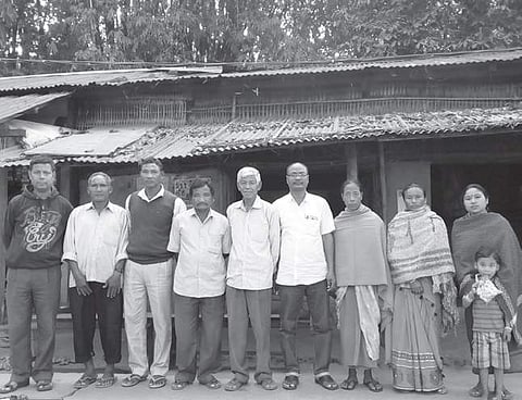 A group of Rabhas tribesmen at Salpara in Assam |  Express