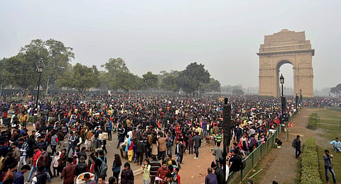 People thronging India Gate in New Delhi on the first day of the New Year on Monday led to massive traffic jams in the city |  pti