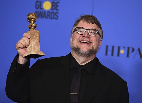 A file image of Guillermo del Toro posing in the press room with the award for best director  for 'The Shape of Water' at the 75th annual Golden Globe Awards. (Photo | AP)