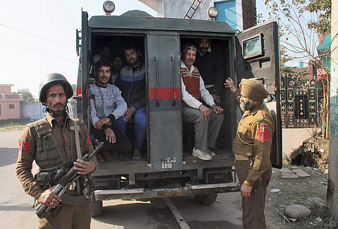 Villagers being evacuated by Jammu and Kashmir police personnel after heavy shelling by Pakistani forces on the border at Kanachak village in Jammu on Saturday. | PTI