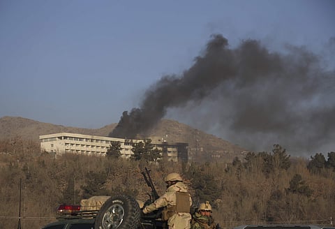 Black smoke rises from the Intercontinental Hotel after an attack in Kabul, Afghanistan. | AP