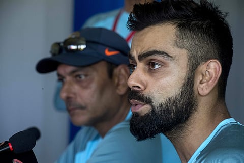 Indian cricket captain Virat Kohli, right, with coach Ravi Shastri. | AP
