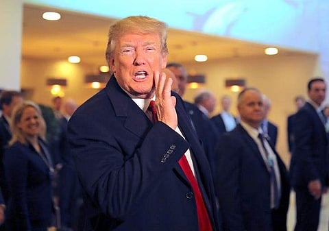 U.S. President Donald Trump waves as he arrives at the World Economic Forum (WEF) annual meeting in Davos, Switzerland January 26, 2018. (Photo: Reuters)