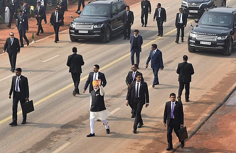 Prime Minister Narendra Modi waves at the crowd during the parade in Rajpath, New Delhi. (Photo | PTI)