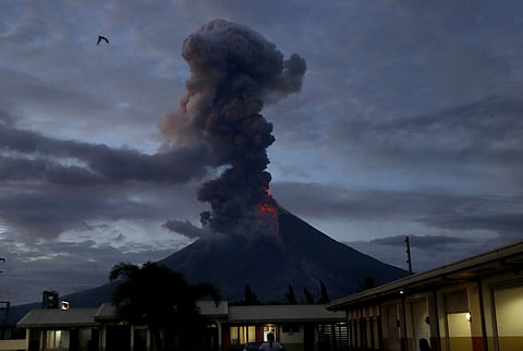 Tens of thousands more people have fled an erupting volcano in the Philippines, as foreign tourists arrived to watch the flaming lava and giant clouds spurting from its crater. (Photo | AP)
