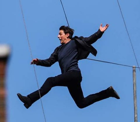 Tom Cruise, in the middle of doing the stunt for Mission Impossible 6 which would injure him seconds later. (File | Twitter)